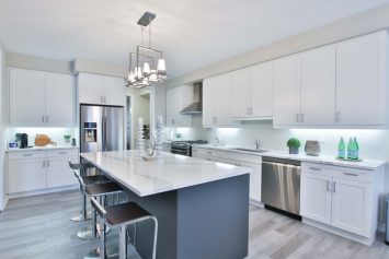 a white and gray remodeled kitchen