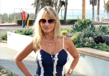 Super hot women wearing a navy blue and white maxi dress Heather Winfield