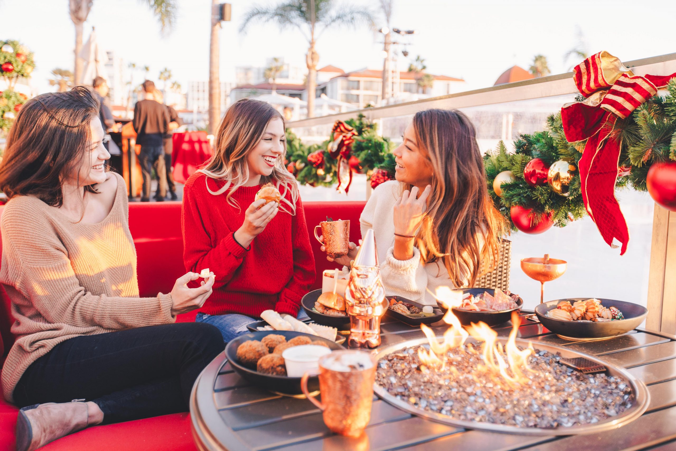 Three women on Christmas Eve dining at the Hotel Del Coronado in San Diego