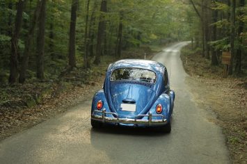VW Bug taking a road trip with car insurance.