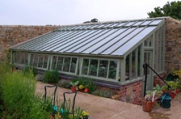 the outside of a metal greenhouse
