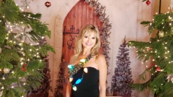 Blonde woman, Heather Winfield, Attending a Holiday Party with a gift