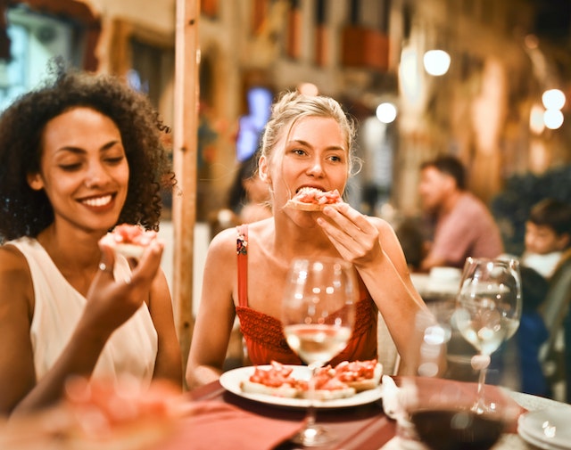Two women eating at a restaurant
