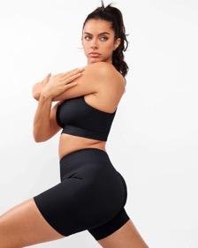woman in a black activewear sets