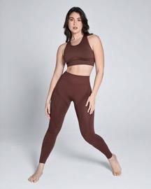 a woman wearing an activewear sets