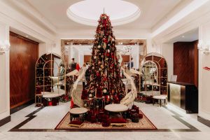 A Christmas tree all lit up at the the Grand Hotel Kempinski Riga 