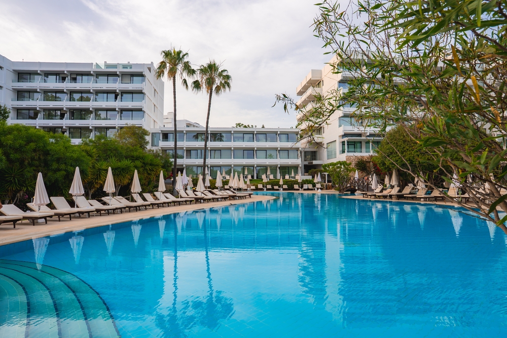 A modern hotel resort in Cyprus with a large pool,