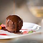 a dessert with chocolate dripping over the top for your Valentine.