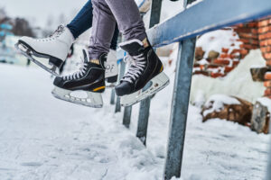 ice-rink-close-up-view-skates-scaled