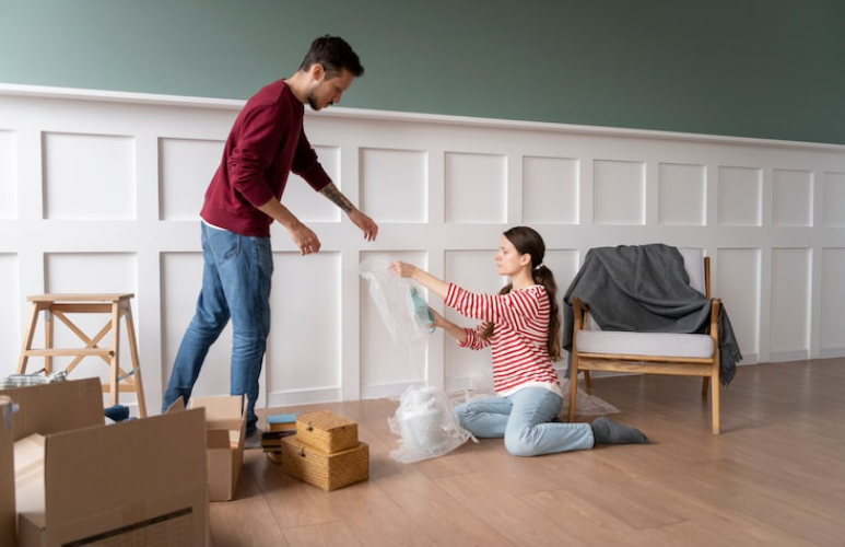 couple working on to organize home