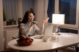 A girl working on a call under a light