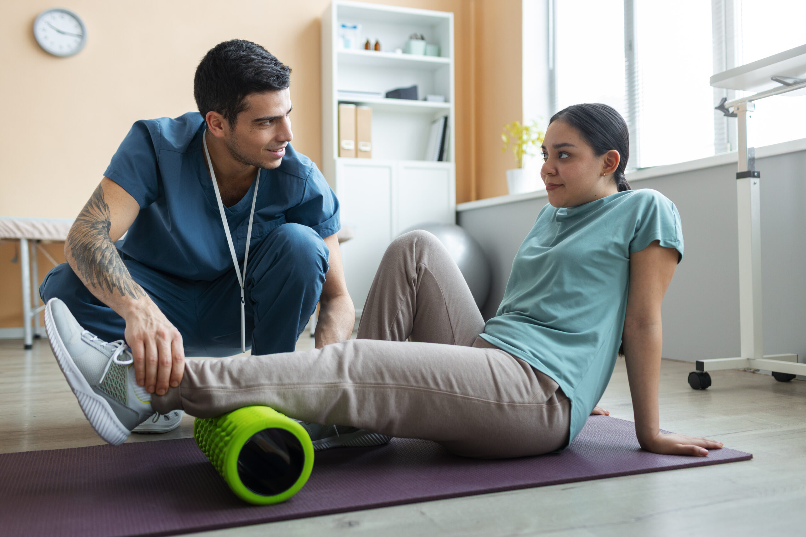 doctor-helping-patient-rehabilitation
